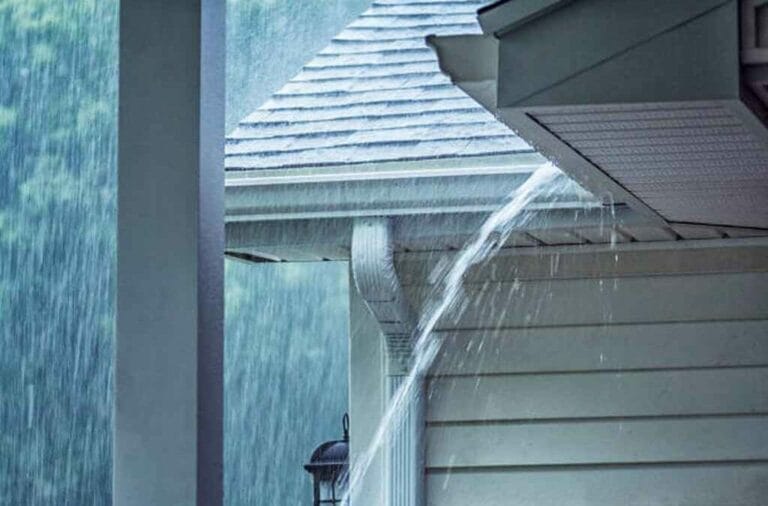 heavy rain off roof during season weather event.