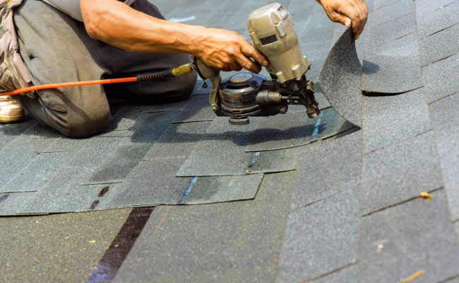 Technician Completing Roof Repairs